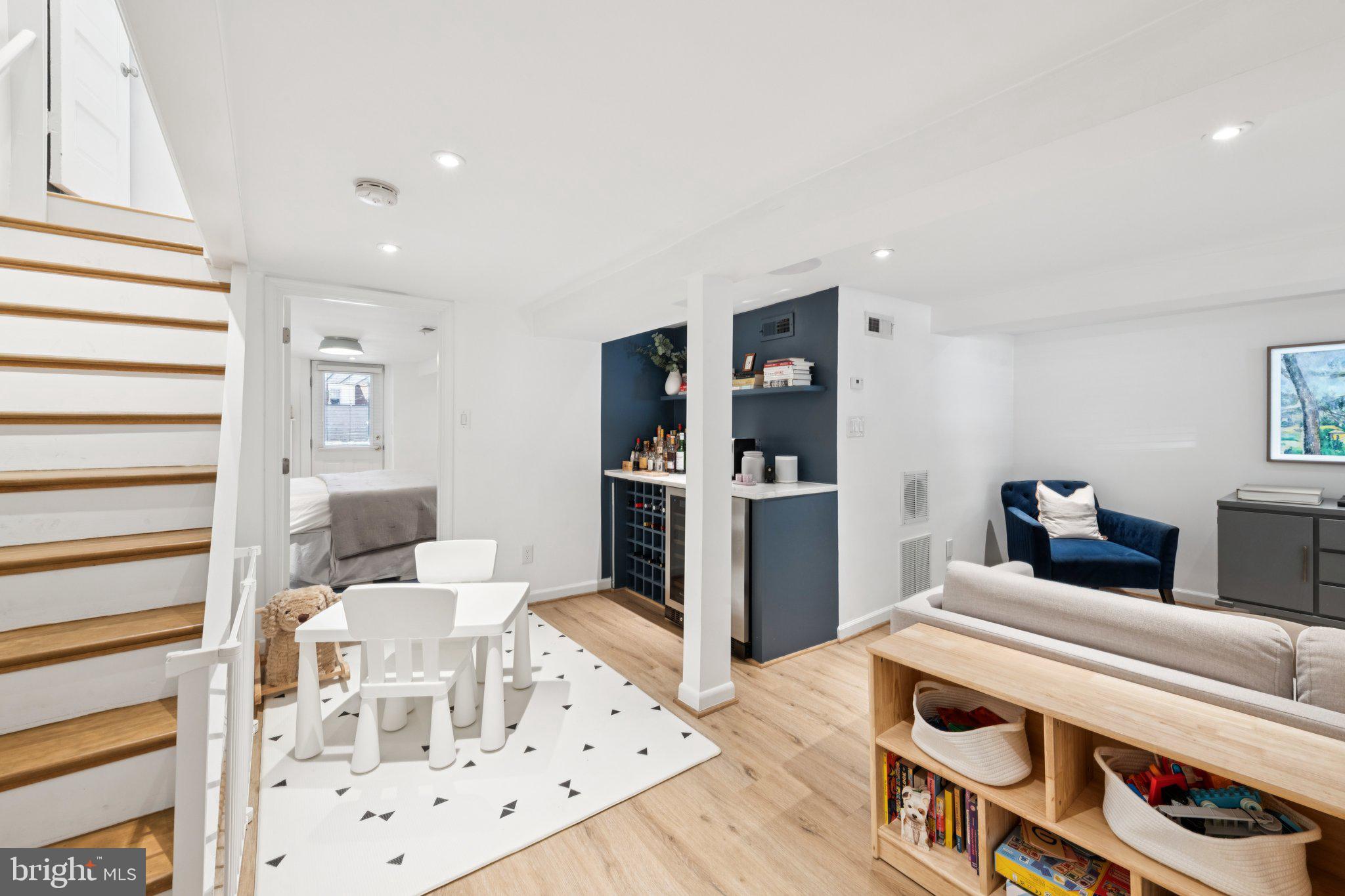 21 V Street Northeast Washington, DC 20002 - Photo 14 of 32 a living room with furniture and kitchen view