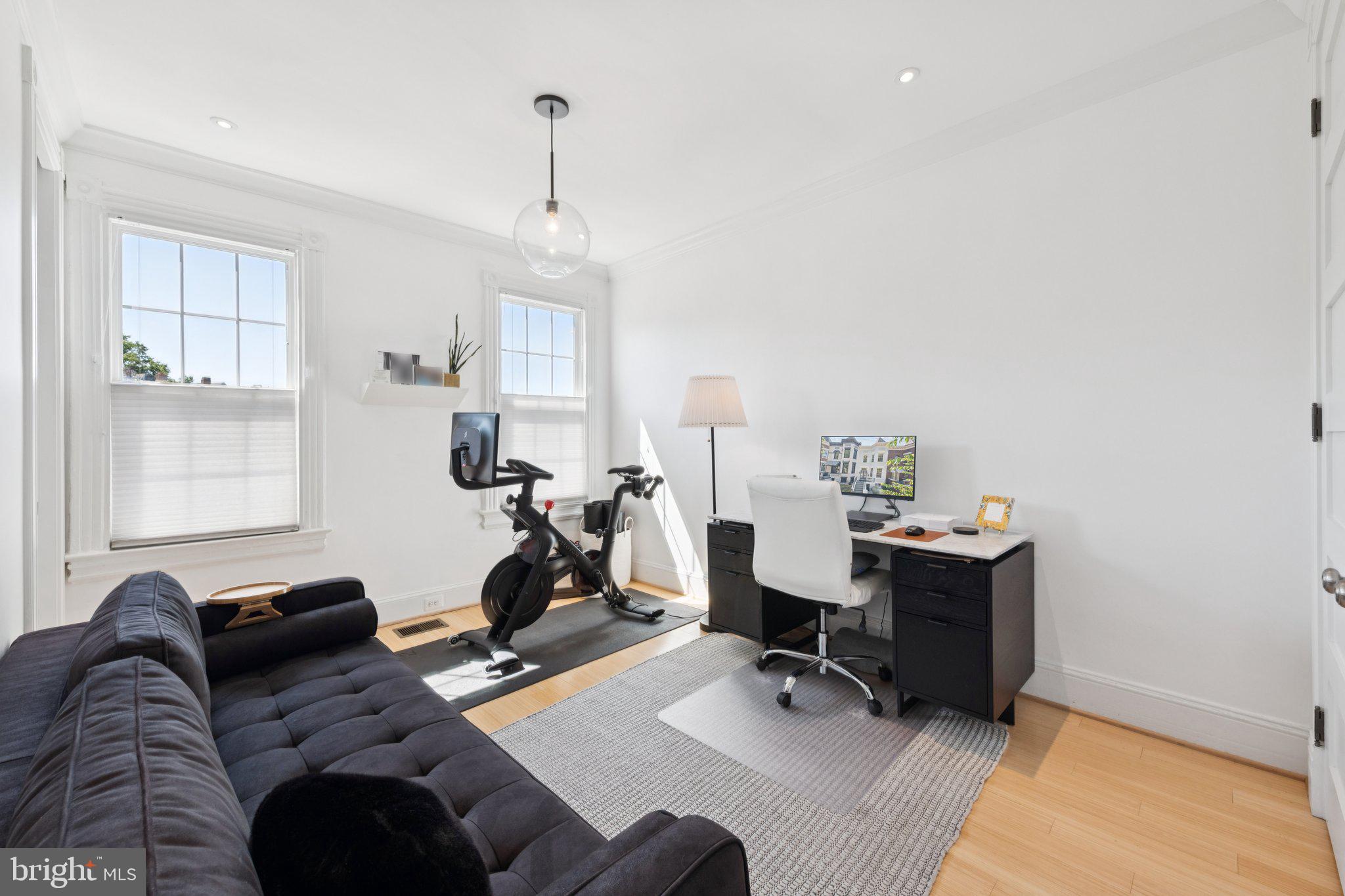 21 V Street Northeast Washington, DC 20002 - Photo 23 of 32 a view of a workspace with furniture and a window
