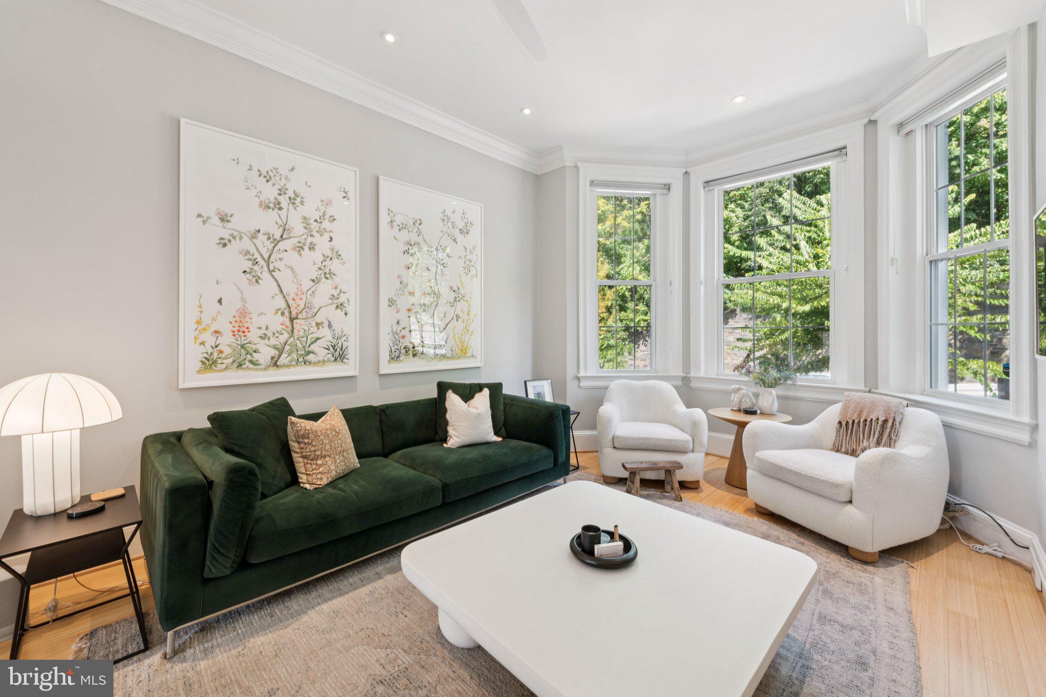 21 V Street Northeast Washington, DC 20002 - Photo 5 of 32 a living room with furniture and a large window