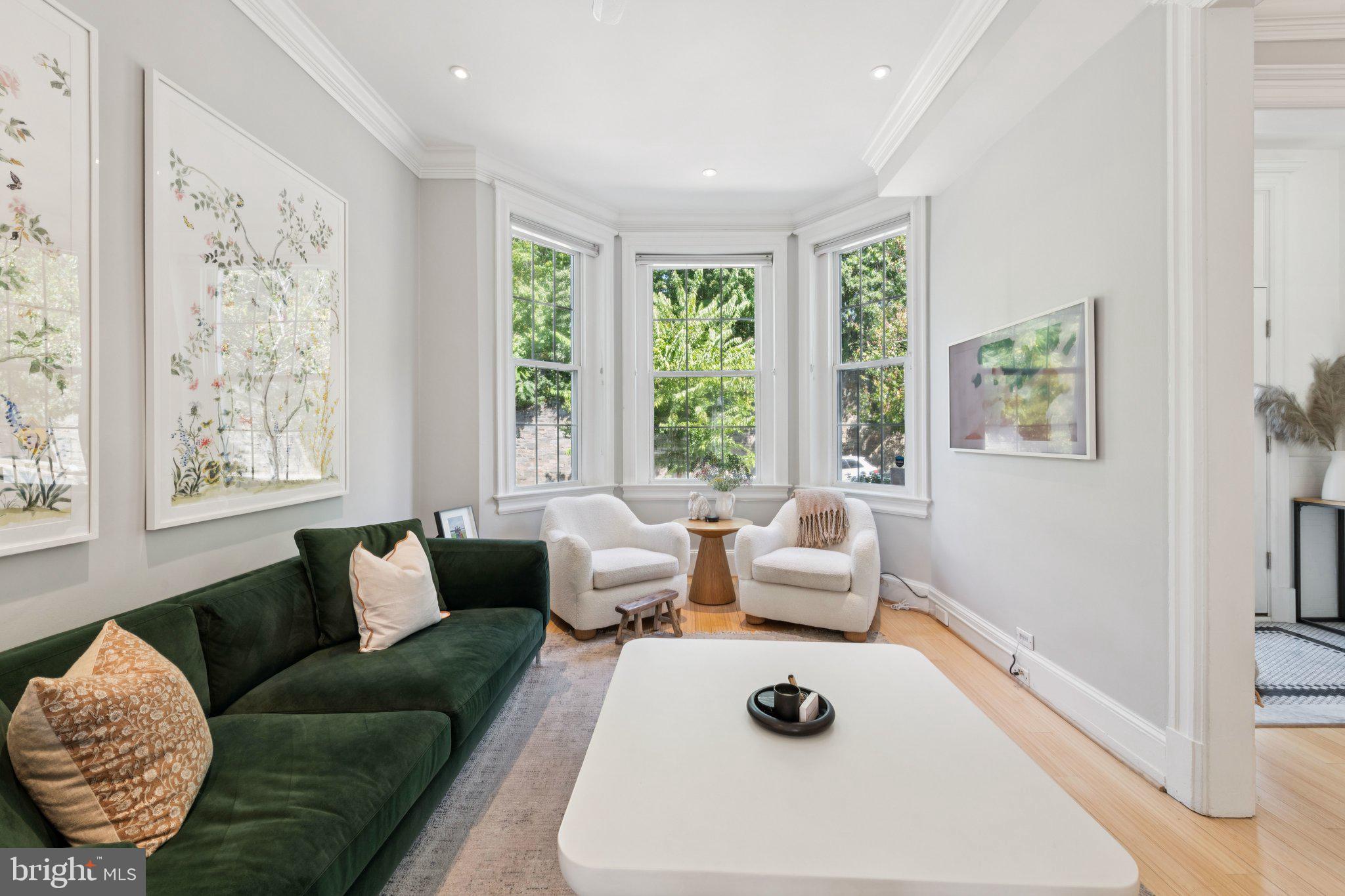 21 V Street Northeast Washington, DC 20002 - Photo 6 of 32 a living room with furniture and a large window