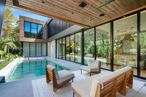 a outdoor living space with patio furniture and a garden