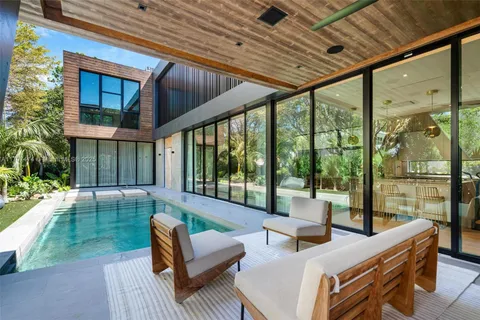 a outdoor living space with patio furniture and a garden