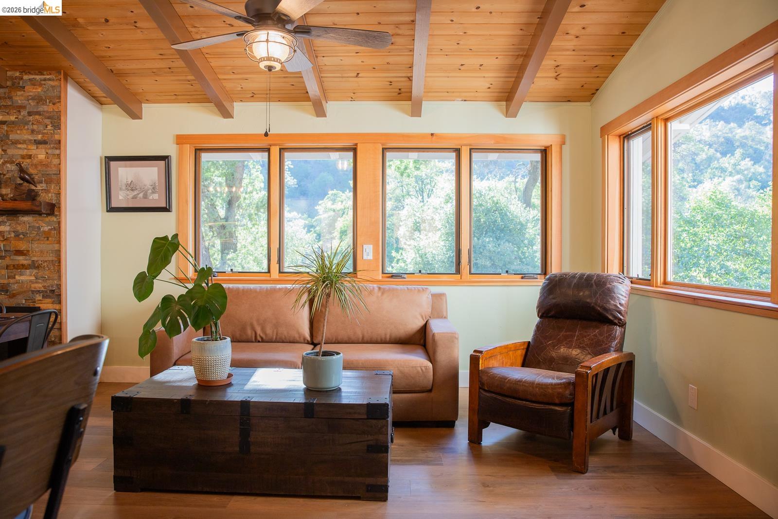18399 Lime Kiln Road Sonora, CA 95370 - Photo 12 of 36 Vaulted wood-paneled ceiling with exposed beams and a ceiling fan