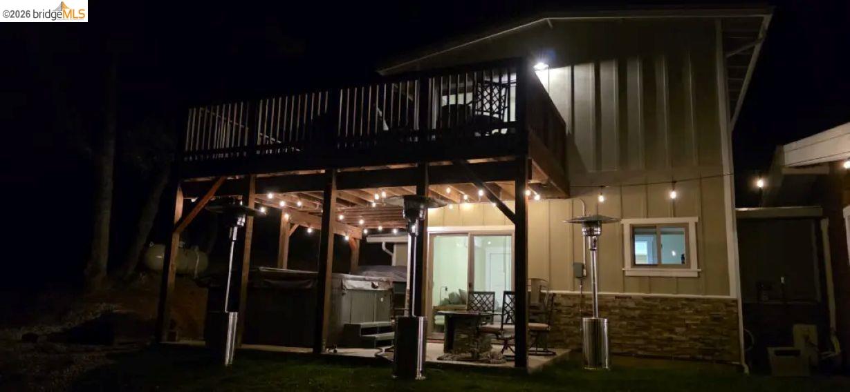 18399 Lime Kiln Road Sonora, CA 95370 - Photo 32 of 36 Two-story exterior featuring a ground-level patio and an upper-level deck