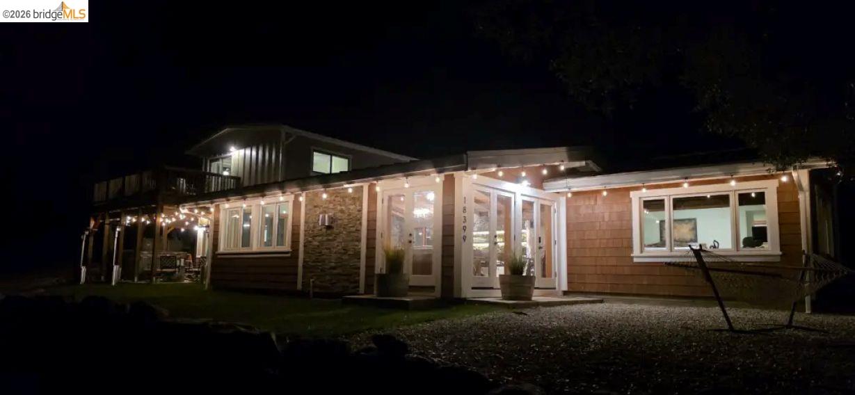 18399 Lime Kiln Road Sonora, CA 95370 - Photo 4 of 36 Exterior featuring wood shingle siding and stone veneer accents