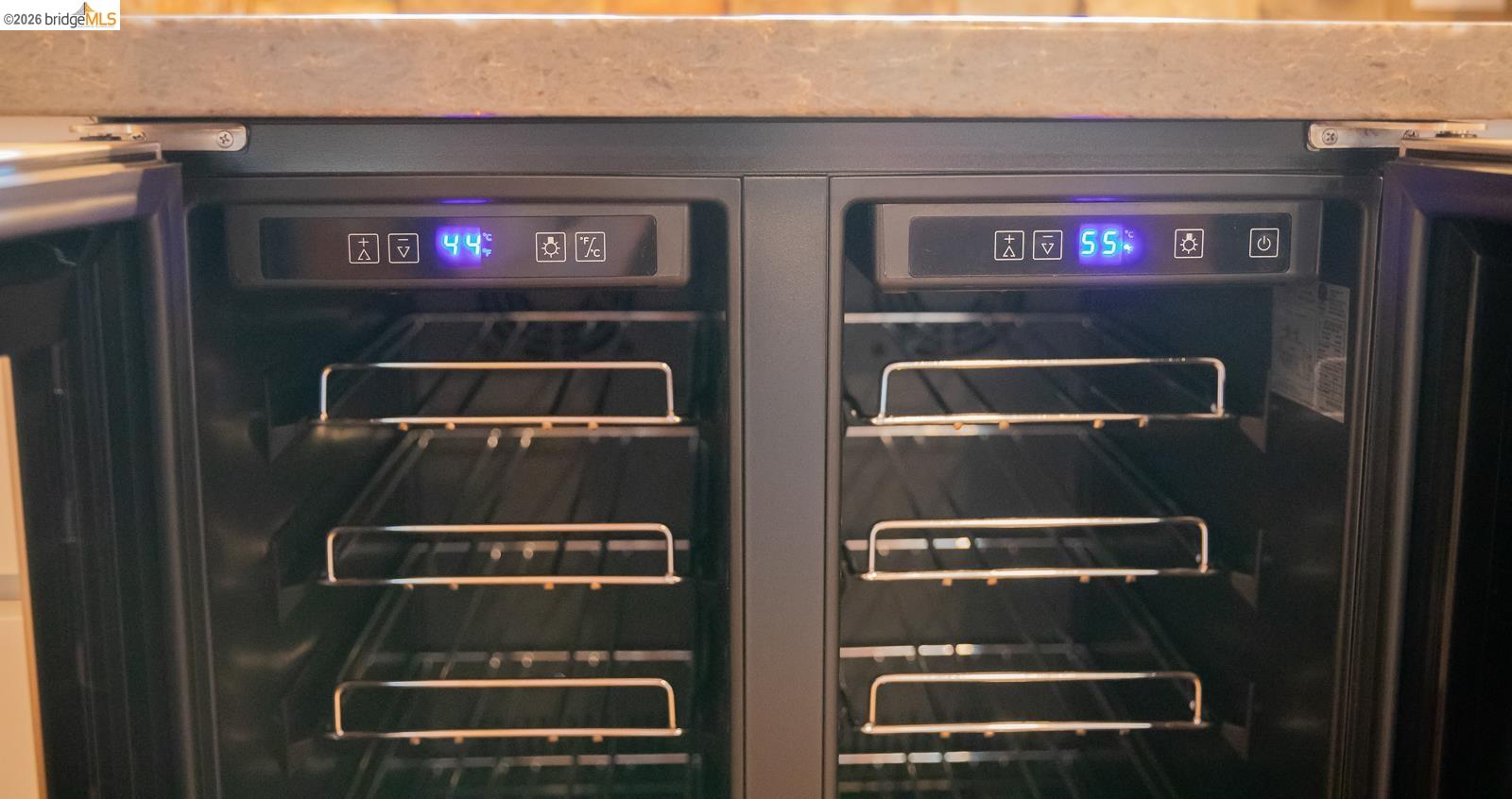 18399 Lime Kiln Road Sonora, CA 95370 - Photo 10 of 36 Built-in dual-zone beverage refrigerator featuring digital temperature displays and multiple wire racks