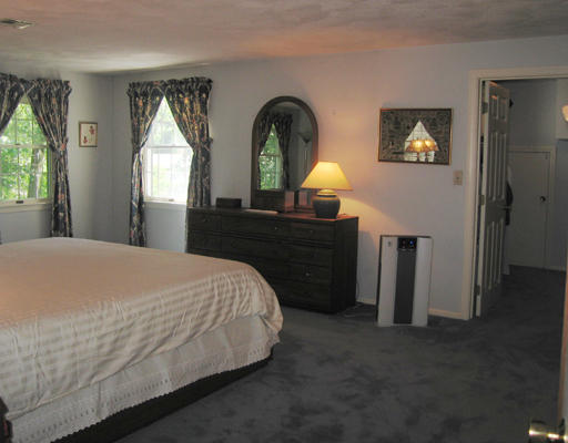 37 Greenwood Road Wellesley, MA 02481 - Photo 11 of 15 a bed sitting in a bedroom next to a window