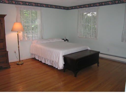 37 Greenwood Road Wellesley, MA 02481 - Photo 13 of 15 a bedroom with a bed and a night stand