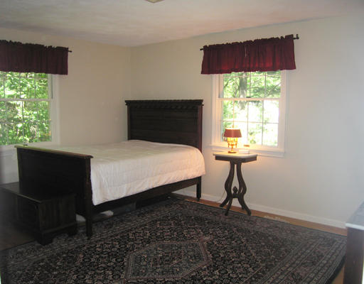 37 Greenwood Road Wellesley, MA 02481 - Photo 14 of 15 a bed sitting in a bedroom next to a window