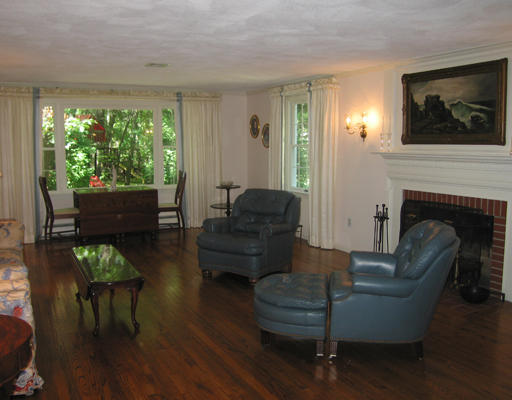 37 Greenwood Road Wellesley, MA 02481 - Photo 3 of 15 a living room with furniture and a fireplace