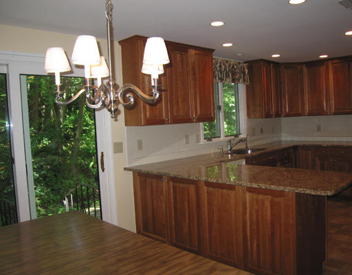 37 Greenwood Road Wellesley, MA 02481 - Photo 7 of 15 a kitchen with a sink a counter top space and cabinets