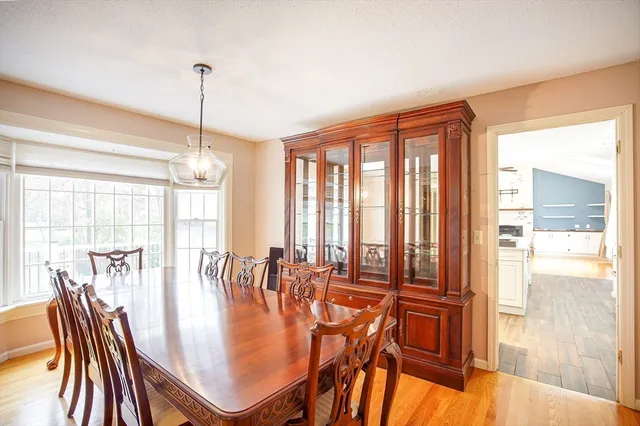 a view of a dining room with furniture window and outside view