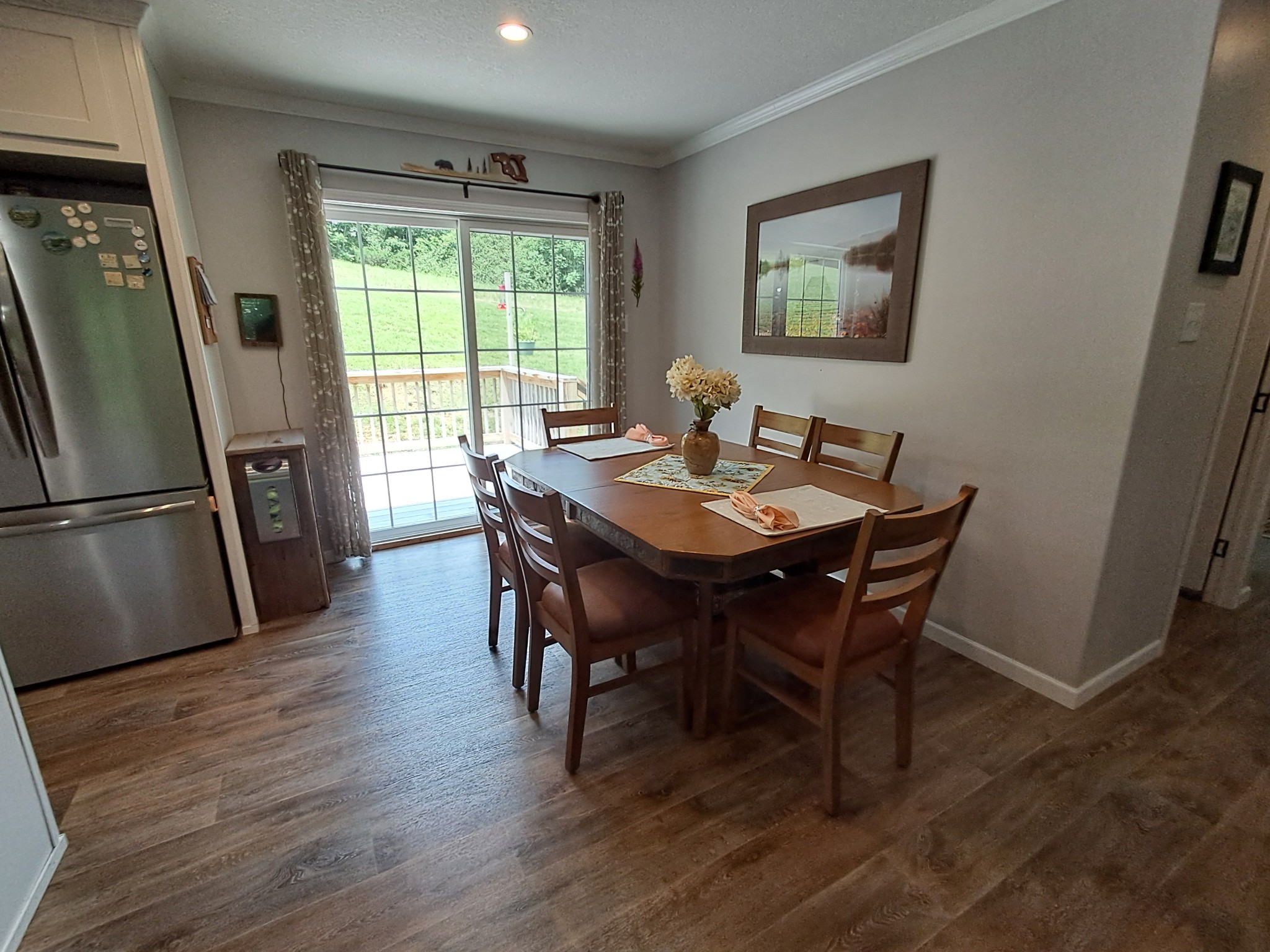 5525 Wiley Hollow Road Culleoka, TN 38451 - Photo 35 of 64 a view of a dining room with furniture window and wooden floor