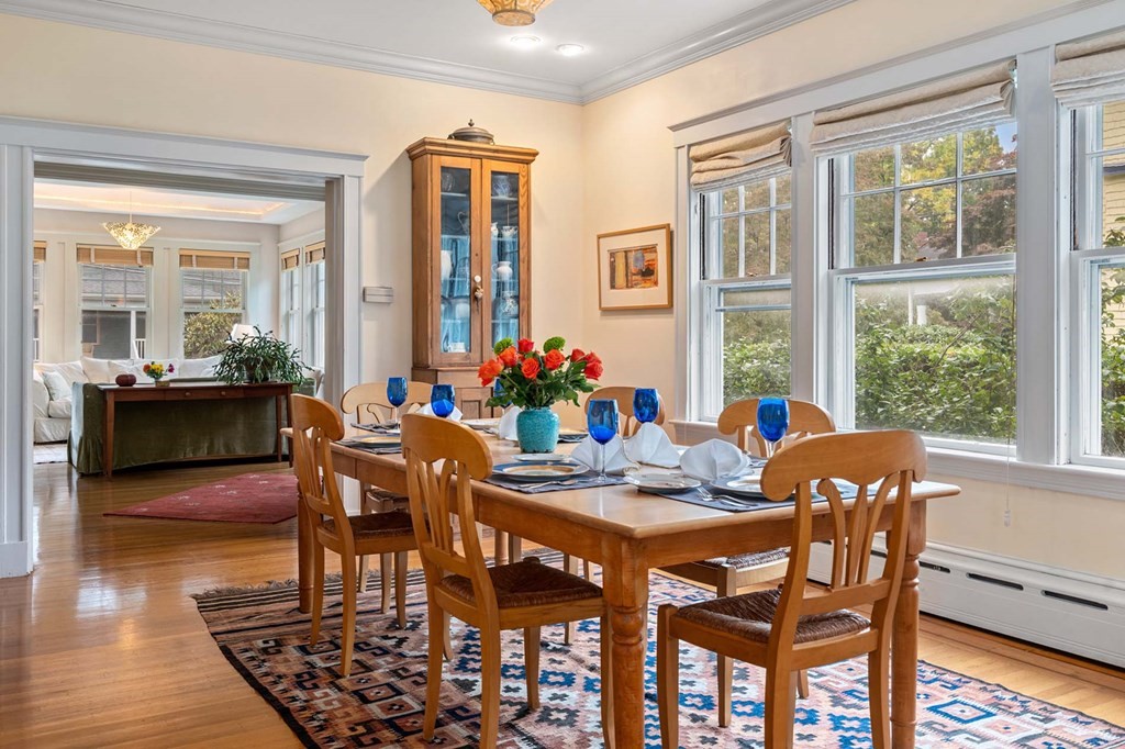 47 Stearns Street Newton, MA 02459 - Photo 12 of 32 a dining room with furniture and wooden floor