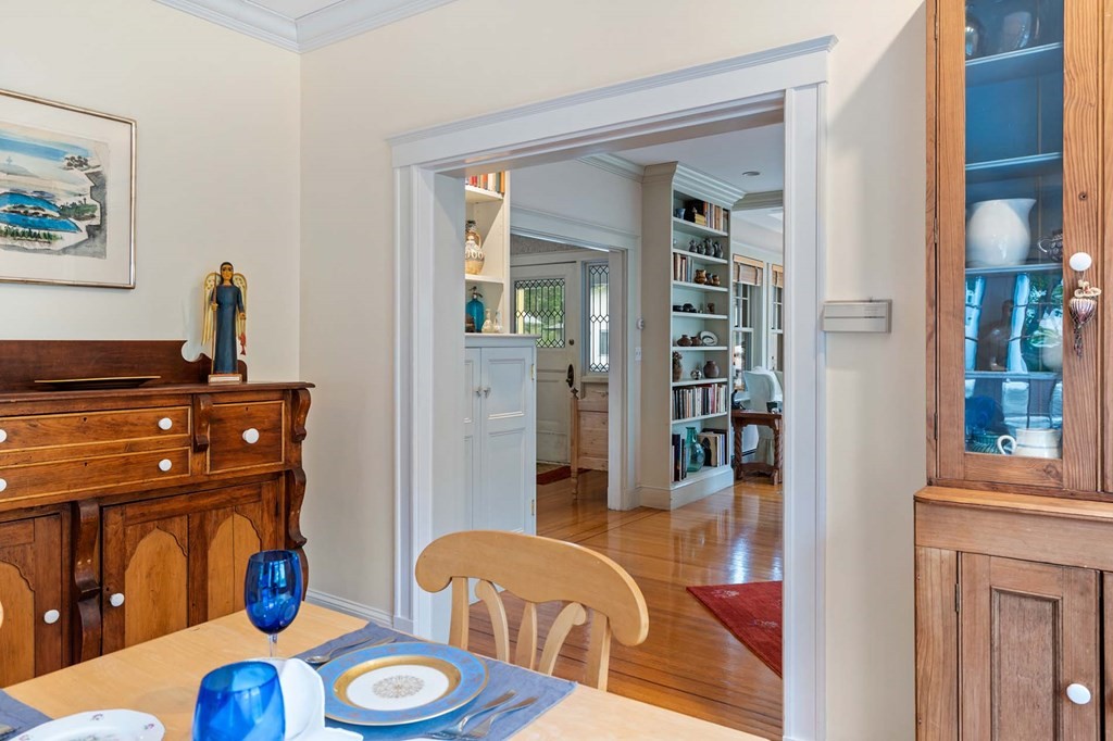 47 Stearns Street Newton, MA 02459 - Photo 13 of 32 a dining room with furniture and wooden floor