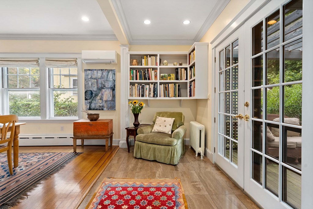 47 Stearns Street Newton, MA 02459 - Photo 14 of 32 a living room with furniture and a floor to ceiling window or wooden floor