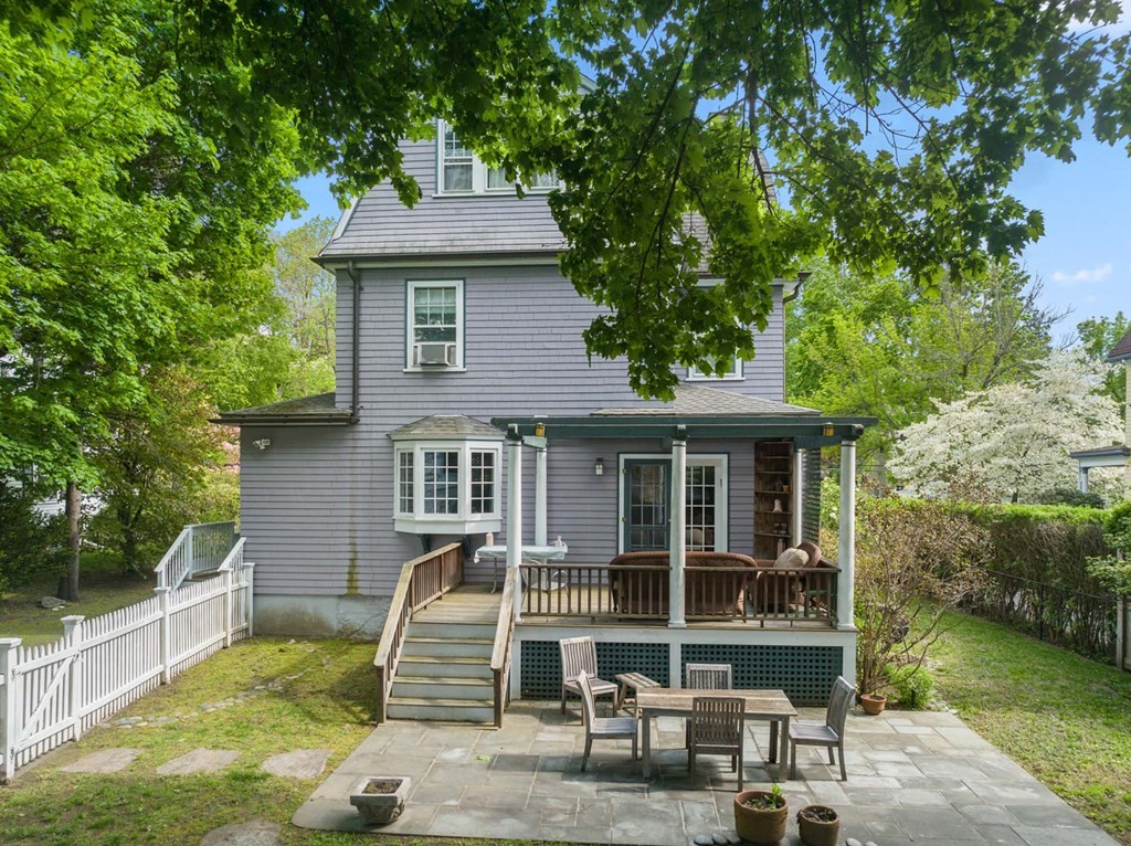 47 Stearns Street Newton, MA 02459 - Photo 30 of 32 a front view of a house with garden