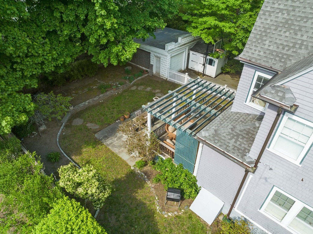 47 Stearns Street Newton, MA 02459 - Photo 31 of 32 an aerial view of a house with a yard basket ball court and outdoor seating