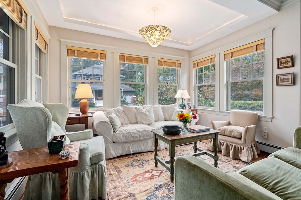 47 Stearns Street Newton, MA 02459 - Photo 9 of 32 a living room with furniture and a large window