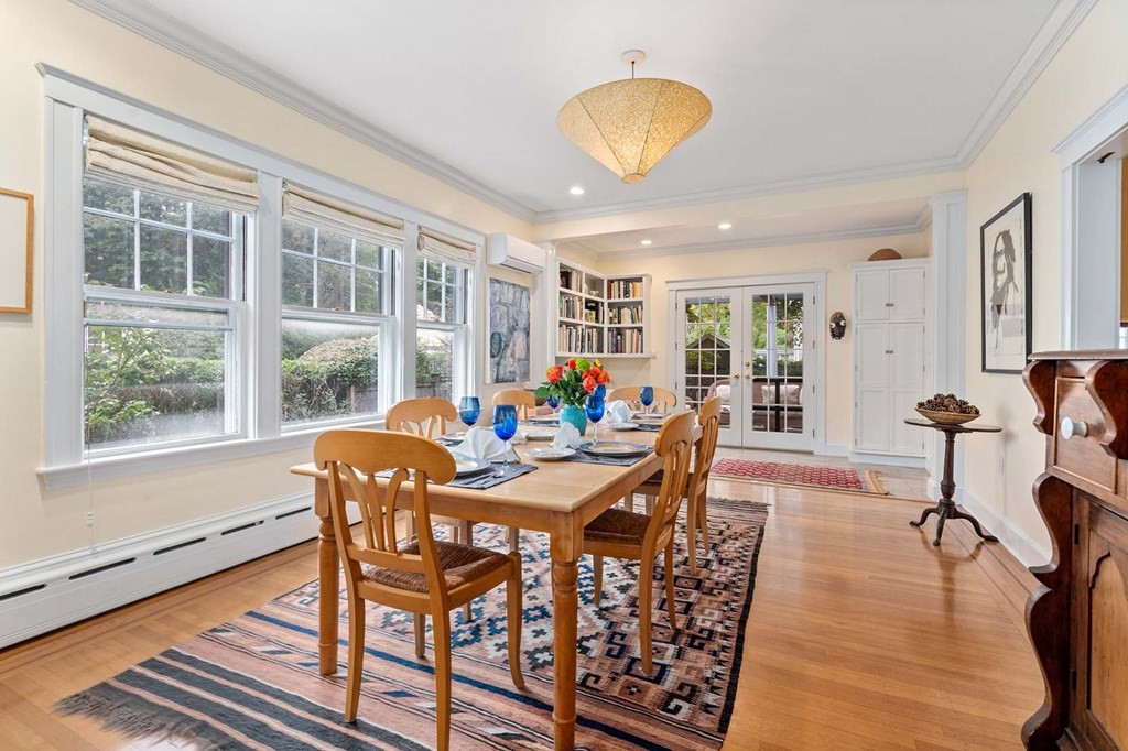 47 Stearns Street Newton, MA 02459 - Photo 10 of 32 a view of a dining room with furniture window and wooden floor