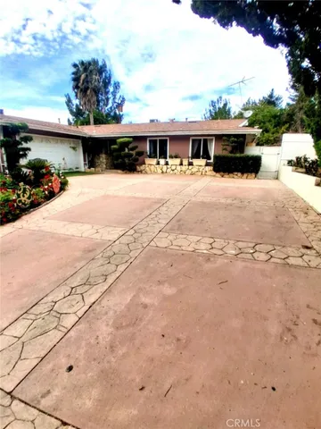 a view of swimming pool with outdoor seating