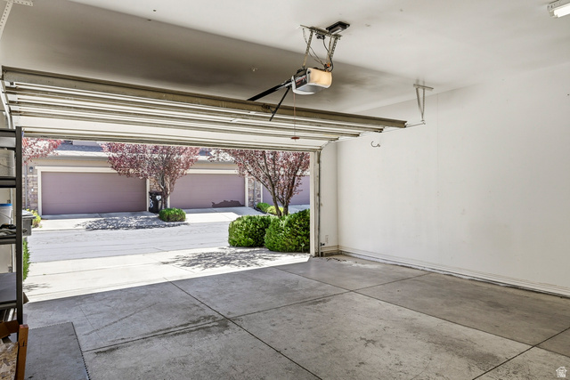 1177 Northfield Road, Unit 26 Cedar City, UT 84721 - Photo 31 of 45 Spacious garage with concrete flooring and an automatic overhead door opener
