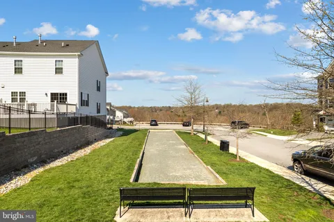 a view of a swimming pool with a lounge chairs