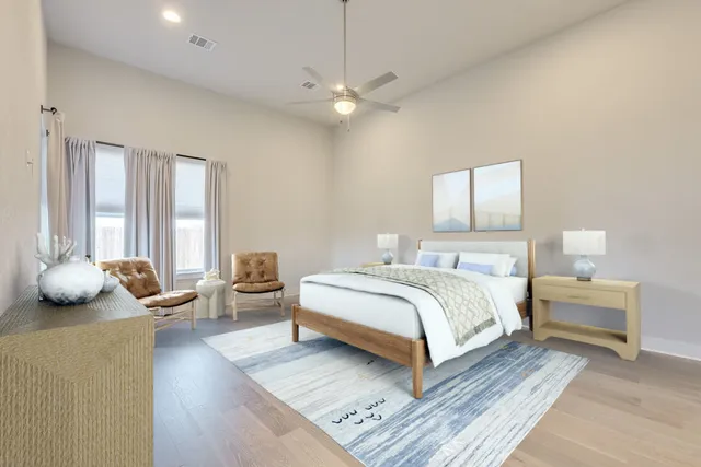 a bedroom with bed and a couch