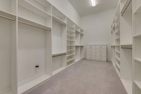a view of an empty walk in closet