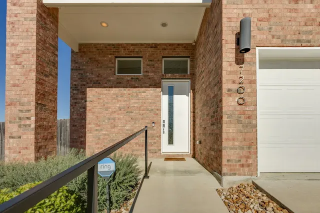 a view of balcony with wooden floor and stairs