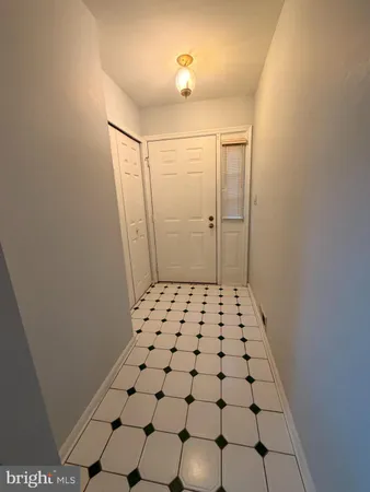 a kitchen with stainless steel appliances granite countertop a stove and a refrigerator