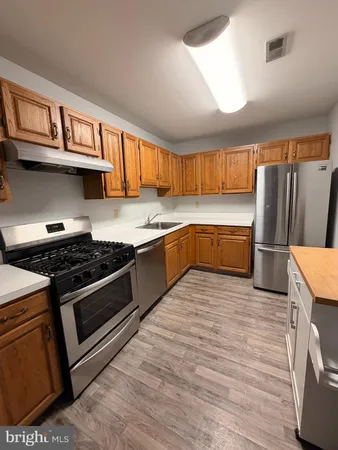 a view of empty room with windows