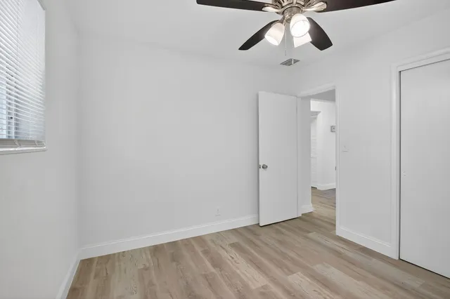 a view of an empty room and window