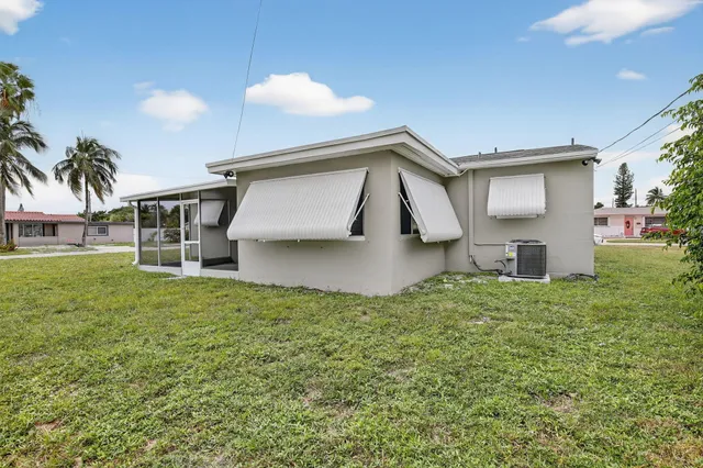 a house view with a garden space