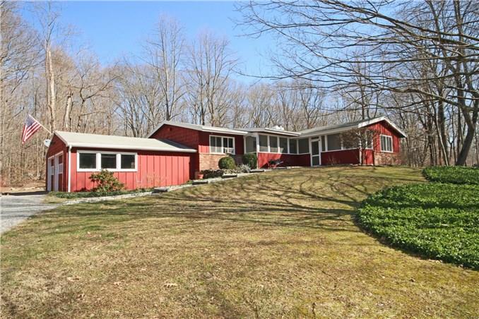 281 Westport Road Easton, CT 06612 - Photo 1 of 1 a view of a house with a big yard and large trees