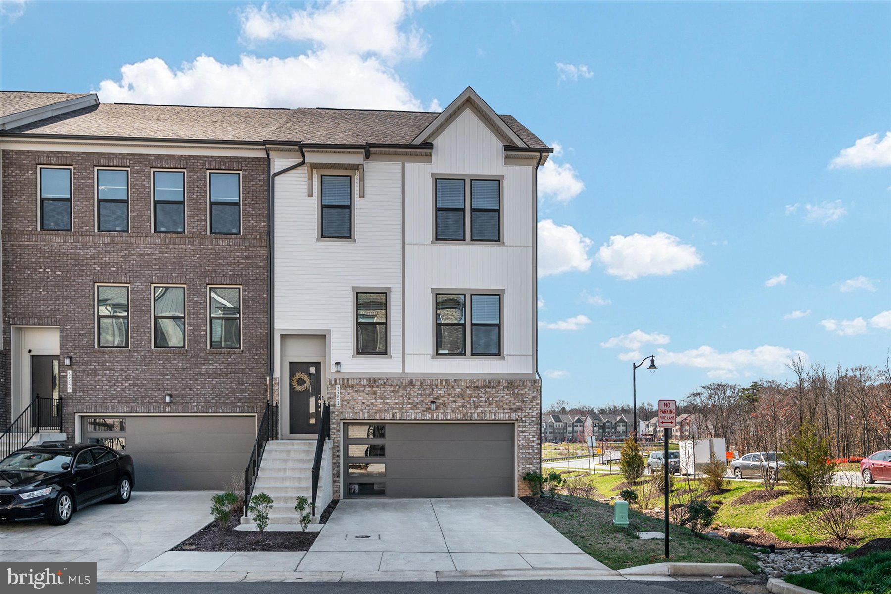3351 Pitch Pine Drive Laurel, MD 20724 - Photo 1 of 43 a front view of a house with a yard