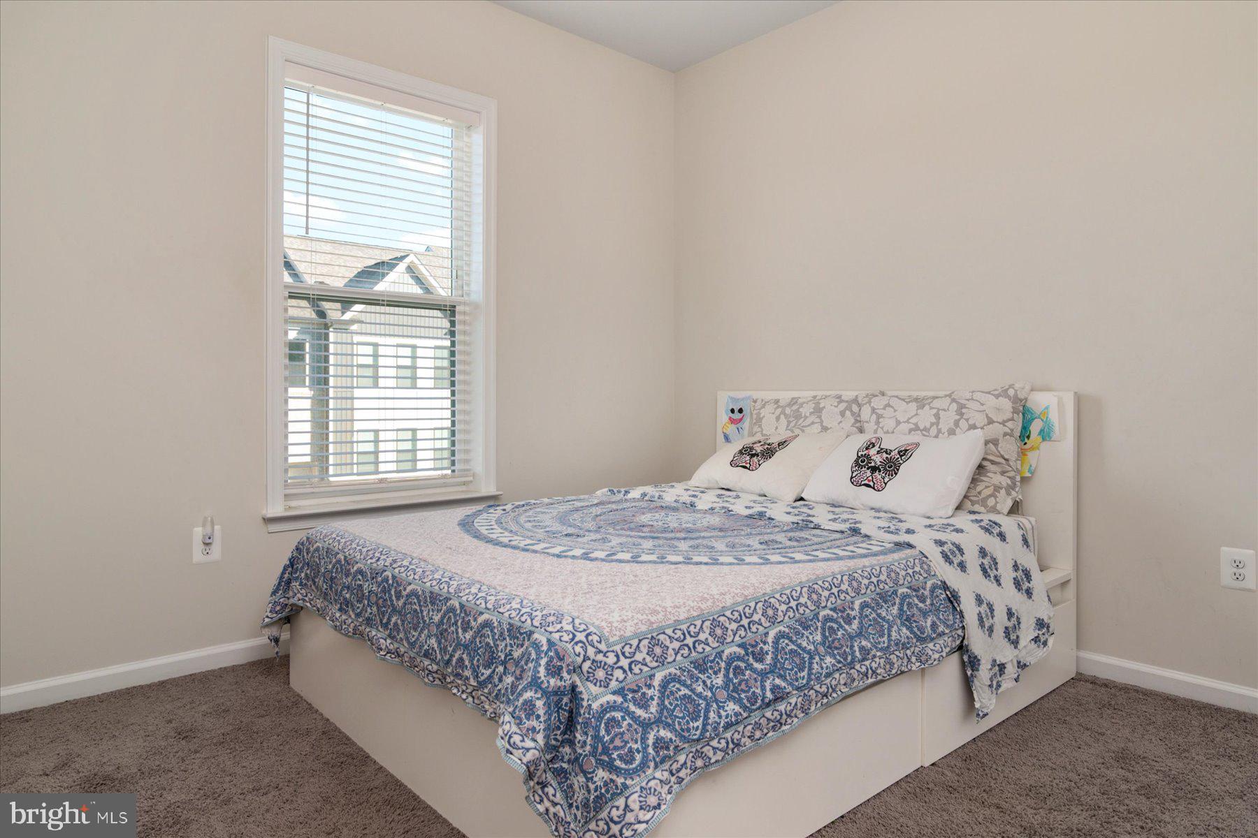 3351 Pitch Pine Drive Laurel, MD 20724 - Photo 11 of 43 a bedroom with a bed and a window