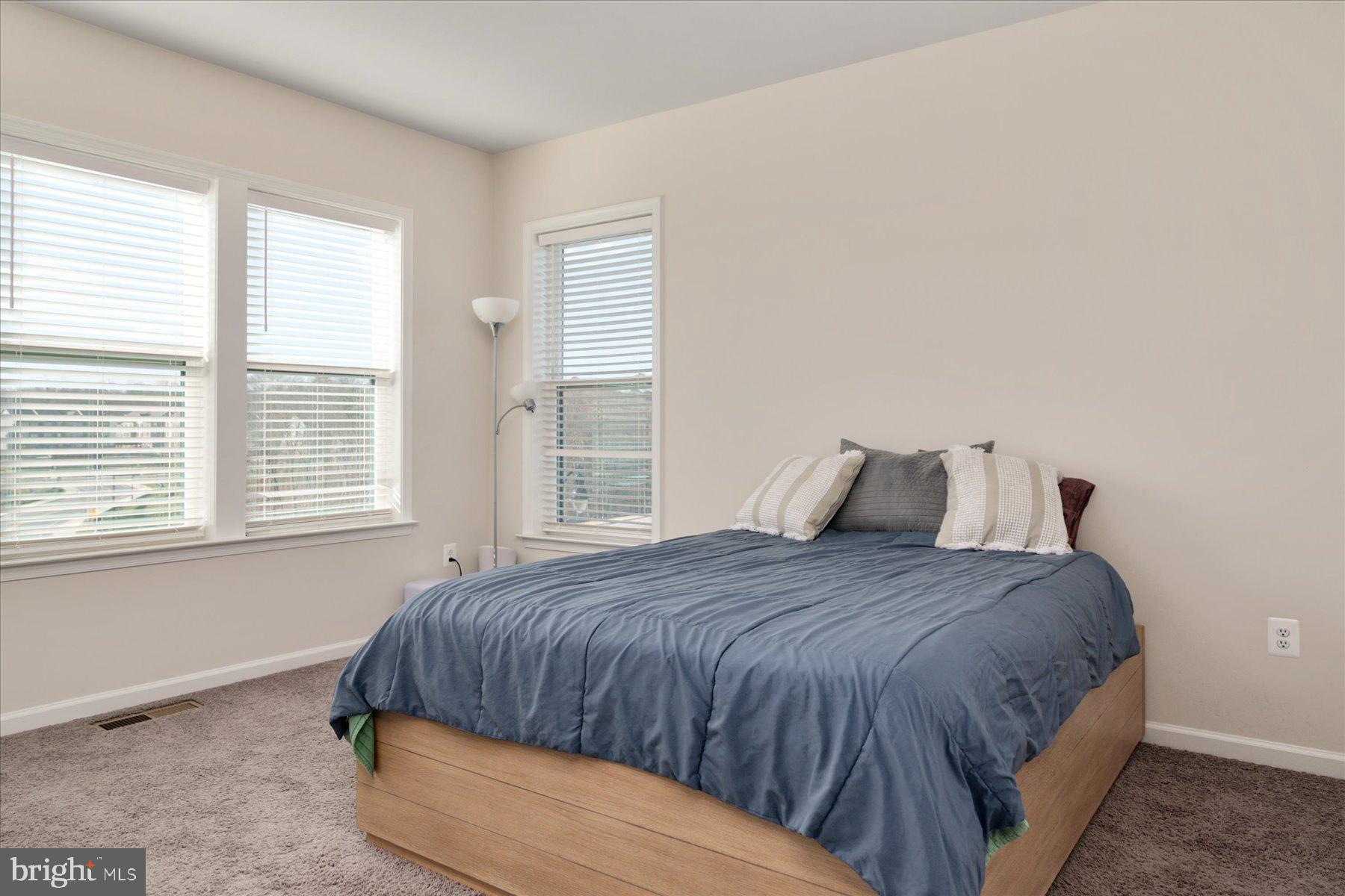 3351 Pitch Pine Drive Laurel, MD 20724 - Photo 16 of 43 a bedroom with a bed and window