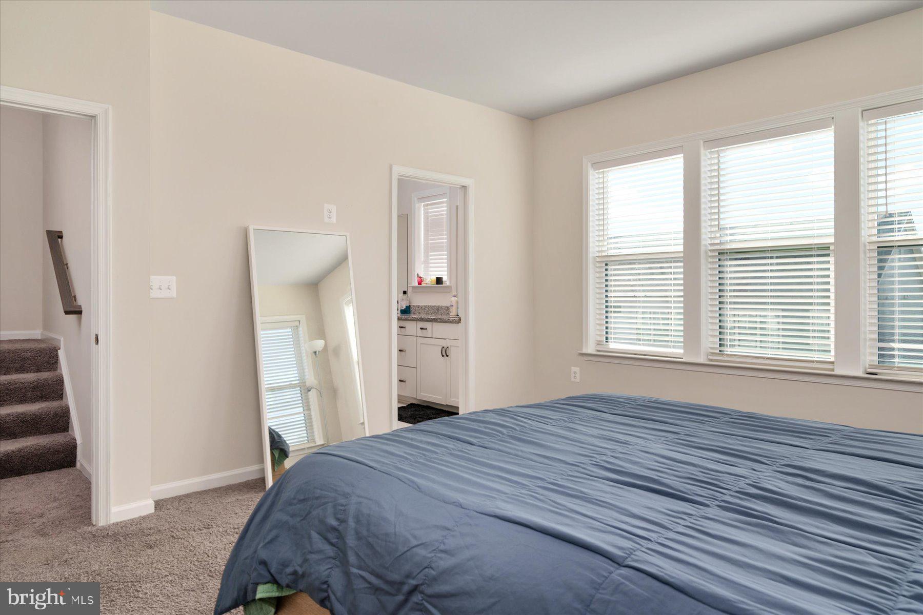 3351 Pitch Pine Drive Laurel, MD 20724 - Photo 17 of 43 a bedroom with a bed and a window