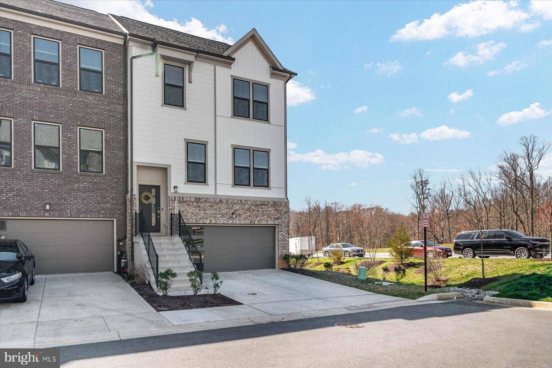 3351 Pitch Pine Drive Laurel, MD 20724 - Photo 2 of 43 a view of a patio with table and chairs and potted plants