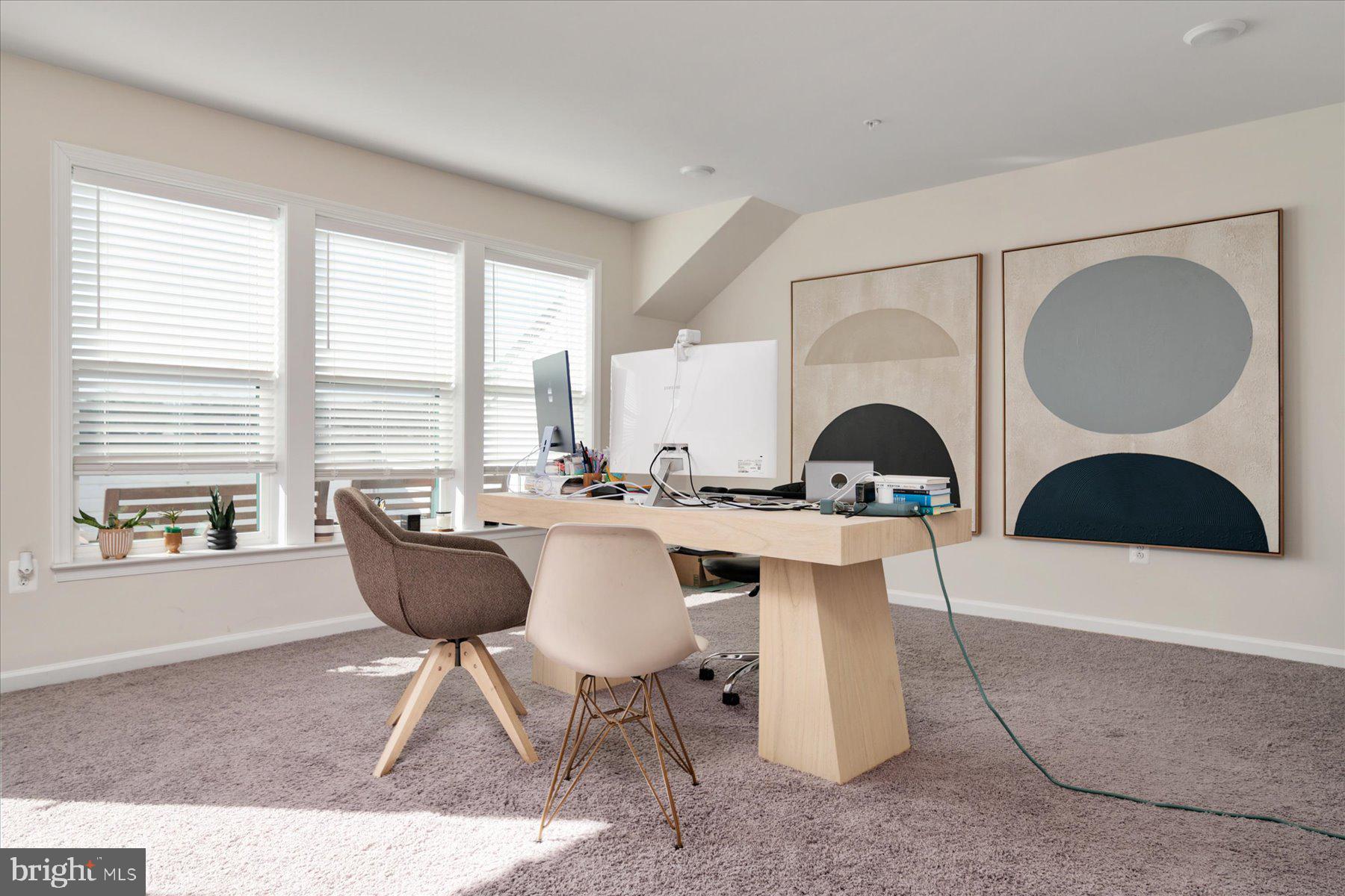 3351 Pitch Pine Drive Laurel, MD 20724 - Photo 21 of 43 a living room with a table chairs and a window