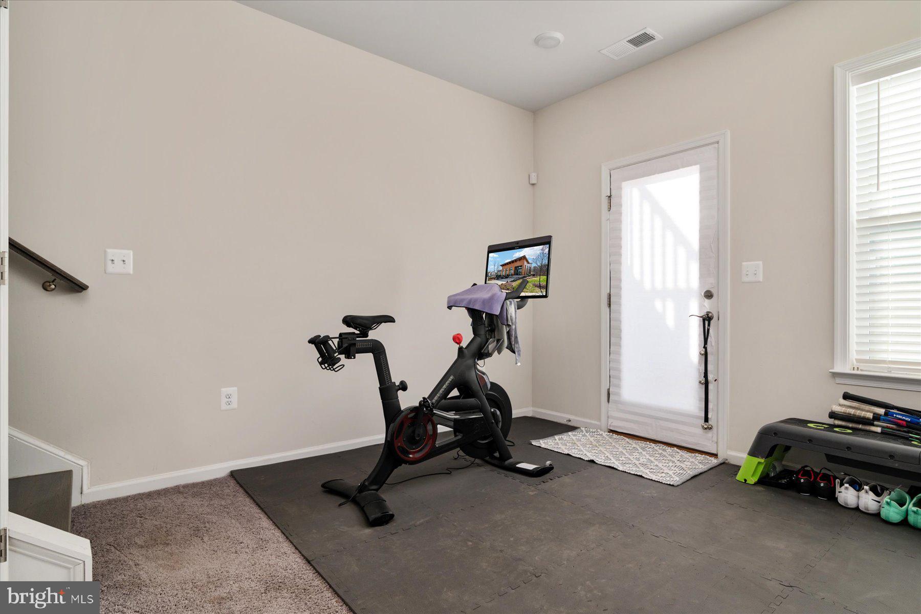 3351 Pitch Pine Drive Laurel, MD 20724 - Photo 29 of 43 a view of a room with gym equipment