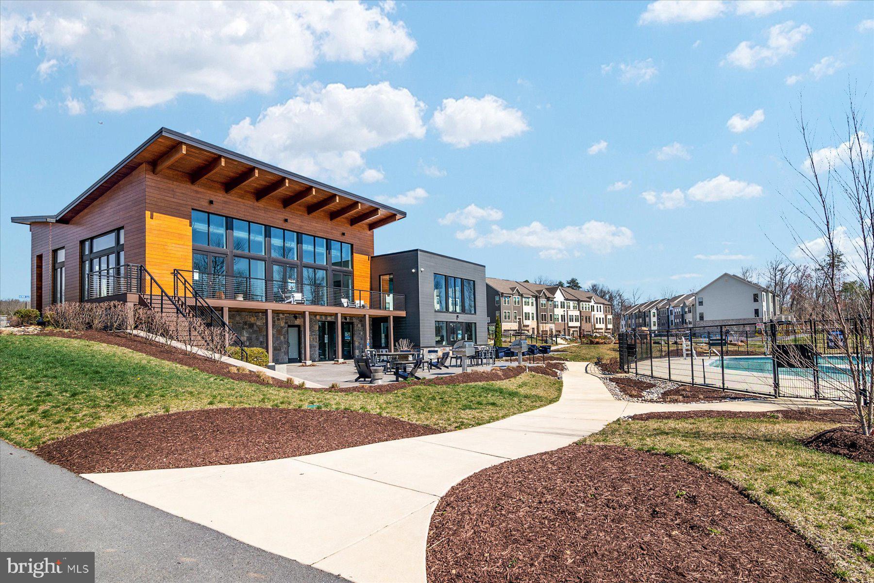 3351 Pitch Pine Drive Laurel, MD 20724 - Photo 39 of 43 a view of a building with a yard