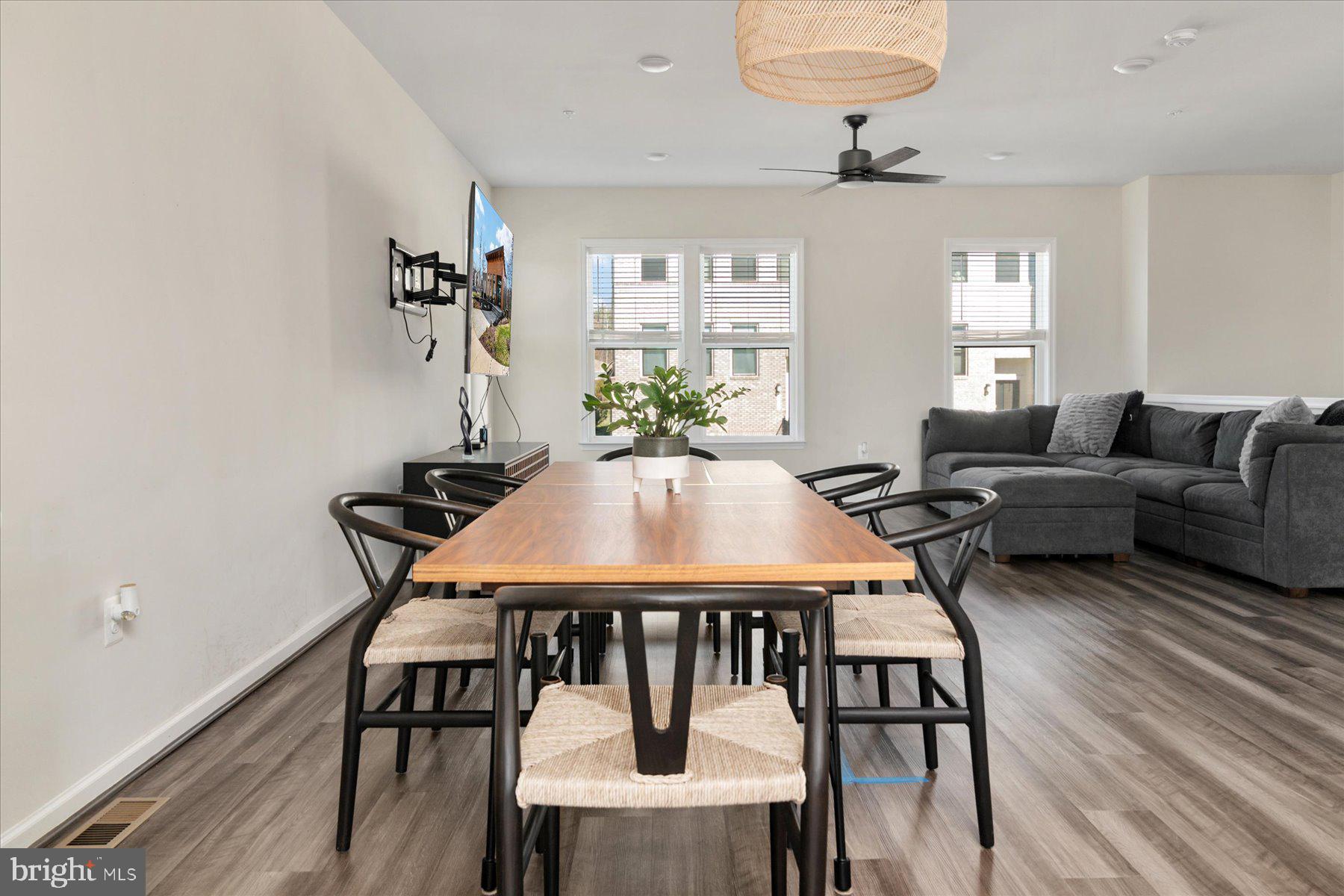 3351 Pitch Pine Drive Laurel, MD 20724 - Photo 7 of 43 a view of a dining room with furniture and wooden floor