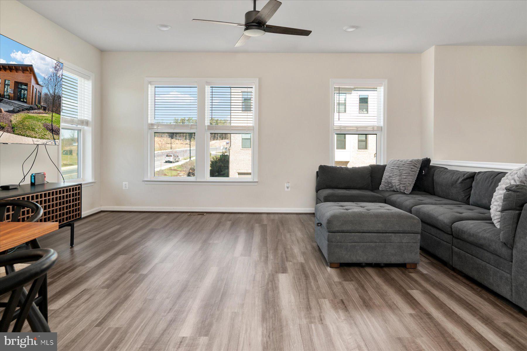 3351 Pitch Pine Drive Laurel, MD 20724 - Photo 8 of 43 a living room with furniture and a window
