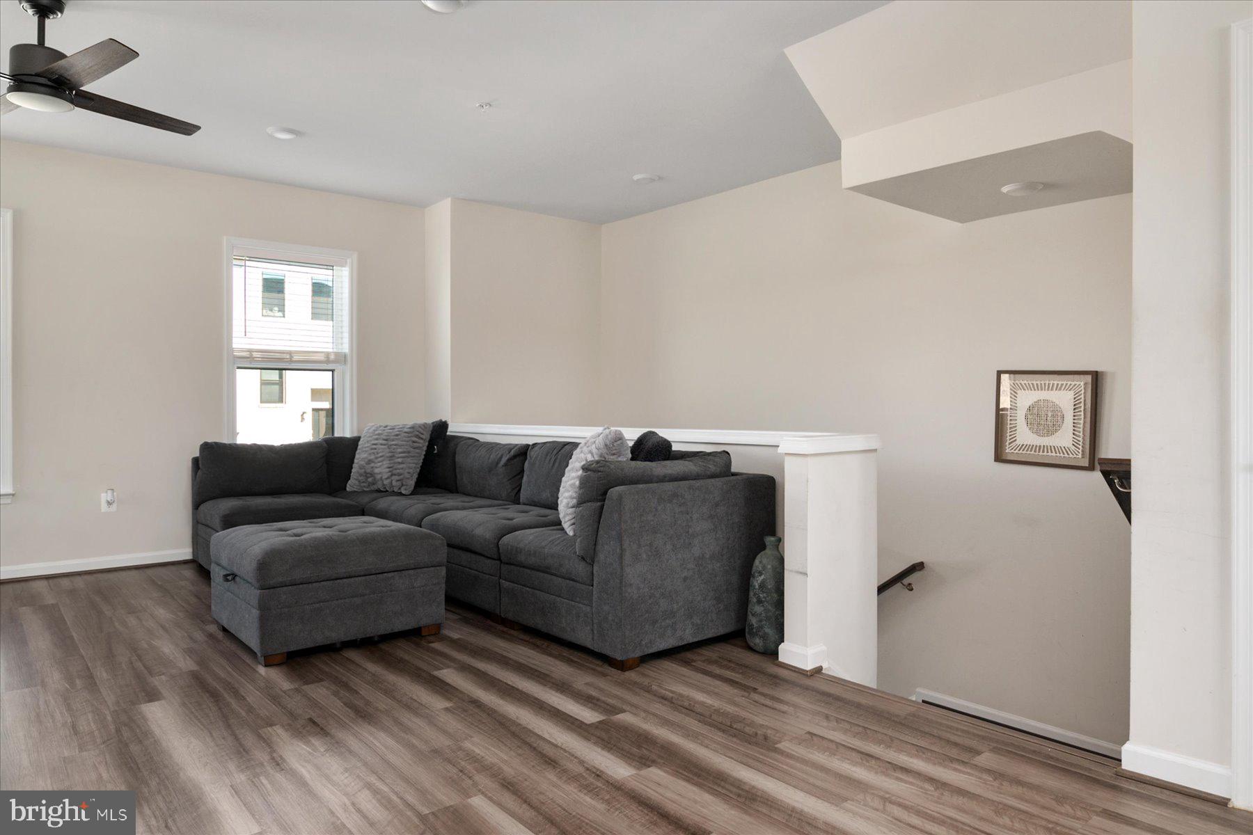 3351 Pitch Pine Drive Laurel, MD 20724 - Photo 10 of 43 a living room with a couch and a window