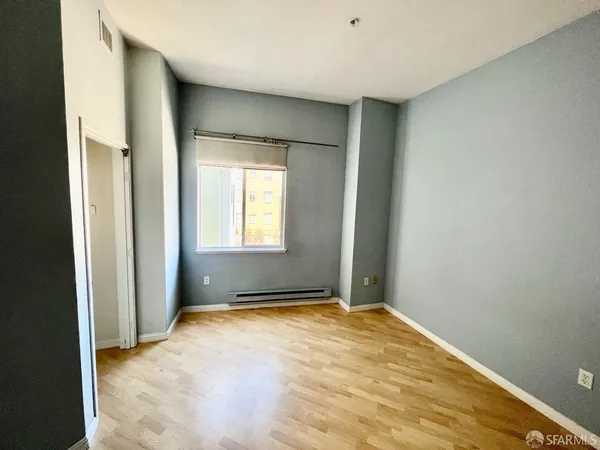 a view of an empty room with window