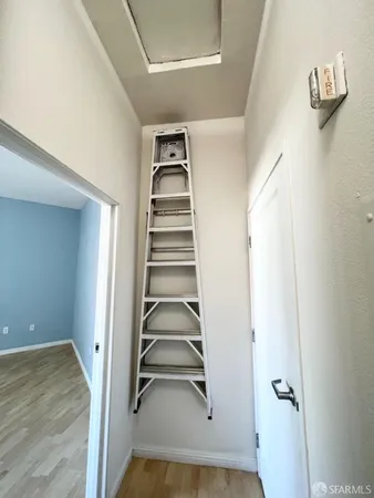 a view of entryway with wooden floor