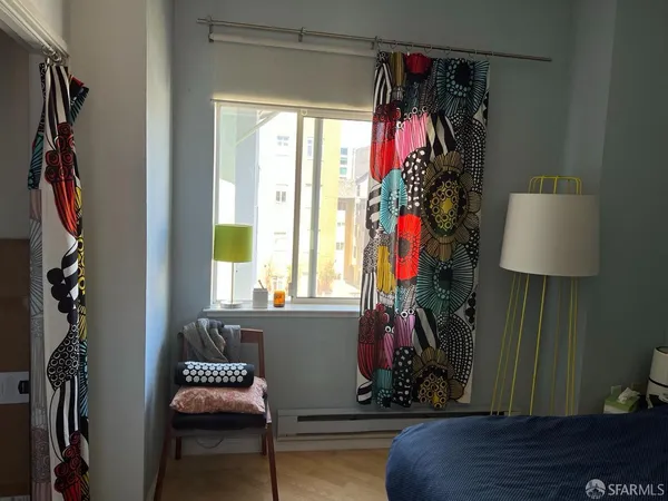 a view of a closet with storage and utility