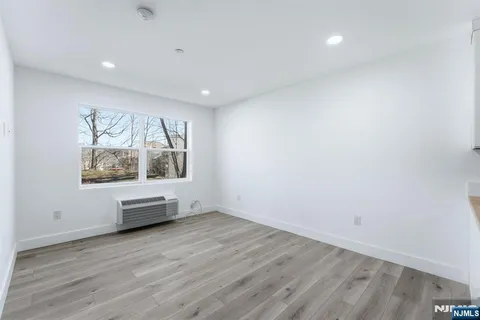 a view of workspace with wooden floor